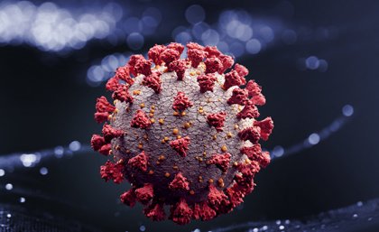 Covid virus with visible spikes of a red colour 